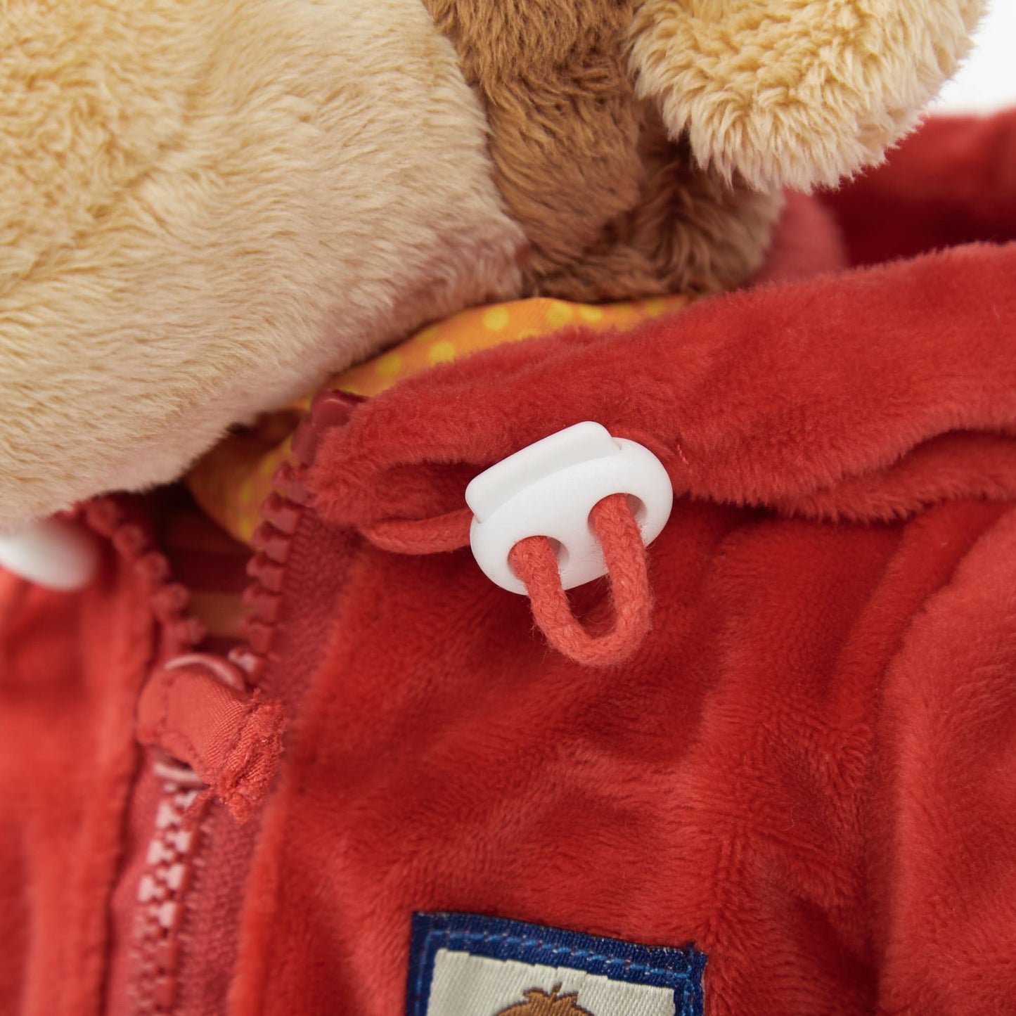 Scimmia Peluche impara a vestire